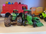 LOT OF 3 JOHN DEERE TRACTOR TOYS. DIFFERENT SIZES AND STYLES.