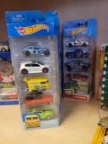 LOT OF (4) MULTI-PACKS OF HOT WHEELS. UNOPENED. INCLUDES (3) VOLKSWAGEN, AND HW HOT TRUCKS.