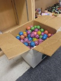 BOX LOT OF ASSORTED BOUNCY BALLS. OVER 50, SOME STILL IN BAGS.