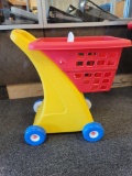 LITTLE TYKES CHILDREN'S TOY SHOPPING CART/BASKET. RED YELLOW AND BLUE. MEASURES APPROX. 12