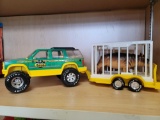 NYLINT CRITTER GITTERS ANIMAL RECOVERY UNIT TOY TRUCK WITH CAGE TRAILER. TRAILER HAS A HIPPO IN IT.