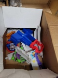 BOX LOT OF ASSORTED PAW PATROL TOY RAMP PARTS AND ACCESSORIES.