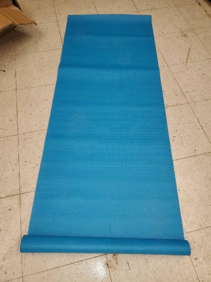 67 5/8"l 24"w BLUE YOGA MAT, PLEASE SEE THE PICTURES FOR MORE INFORMATION.