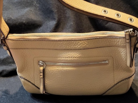AUTHENTIC COACH EAST WEST SOFT DUFFLE TAN LEATHER SHOULDER BAG. NUMBER F12321. IS SOLD AS IS WHERE