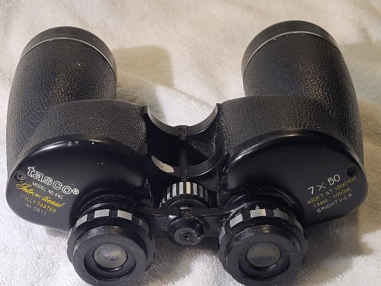 TASCO BINOCULARS. MODEL 440 INTERNATION FULLY COATED. IS SOLD AS IS WHERE IS WITH NO GUARANTEES OR