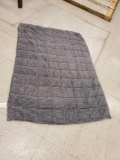 48X72 GREY REVERSIBLE POLYESTER WEIGHTED BLANKET, PLEASE SEE THE PICTURES FOR MORE INFORMATION.