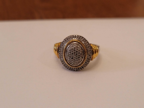 (DR) .925 STERLING SILVER GOLD TONE RING, ACCENTED WITH CLEAR CZ STONES. MARKED ON THE INSIDE "JWER