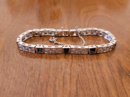 (DR) JOAN RIVERS SILVER TONE BRACELET WITH DARK BLUE SQUARE CUT GEMSTONES, ACCENTED WITH CLEAR CZ