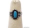 .925 STERLING SILVER LADIES CHILDS TURQUOISE RING. SIZE 3 1/4. 1.5 GRAMS