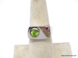 .925 STERLING SILVER LADIES 1 CT PERIDOT RING. SIZE 7. 7.7 GRAMS