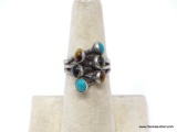.925 STERLING SILVER LADIES NATIVE AMERICAN TURQUOISE AND ONYX RING. SIZE 7 1/2. 3.2 GRAMS