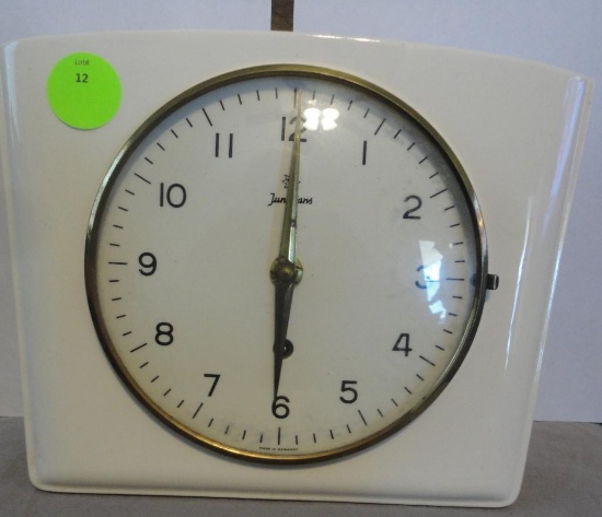 VINTAGE JUNGHNS PORCELAIN CLOCK ALL ITEMS ARE SOLD AS IS, WHERE IS, WITH NO GUARANTEE OR WARRANTY.