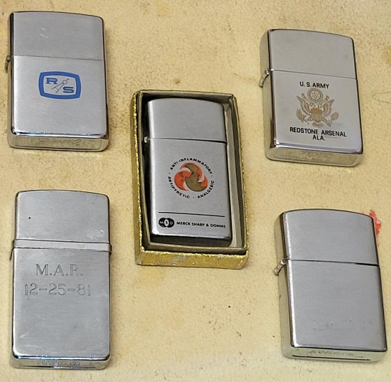 LOT OF 5 LIGHTERS. INCLUDES 2 ZIPPOS, 1 IS A ROGERS, 1 IS A NIMROD, AND 1 IS A BARLOW. IS SOLD AS IS