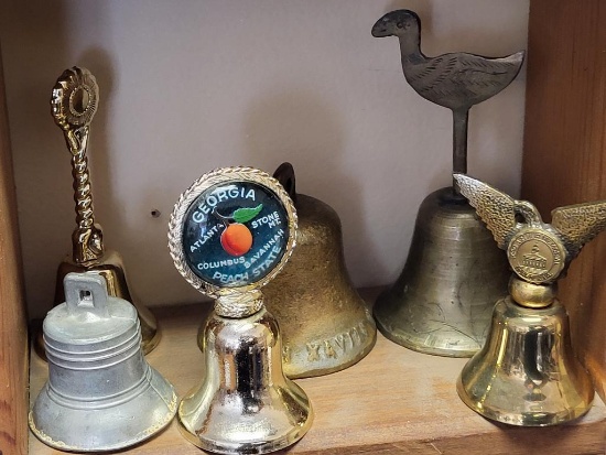 BELL LOT TO INCLUDE A DUCK HANDLE BELL, AN EAGLE HANDLED BELL, A SWIRL HANDLED BELL, ETC. IS SOLD AS