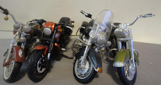 LOT OF 4 TOY MOTORCYCLES ALL ITEMS ARE SOLD AS IS, WHERE IS, WITH NO GUARANTEE OR WARRANTY. NO