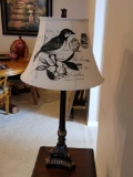 (LR) CONTEMPORARY BRONZE TONE CANDLE STICK STYLE LAMP WITH GOLD TONE ACCENTS, CLOTH BIRD DETAILED