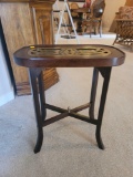 (LR) J.T. IMPORTS SMALL SMOKING STAND/TABLE. INSET BRASS IN CENTER. HAS BURNED MAKERS MARK ON