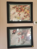 (LR) LOT OF 2 JAPANESE FRAMED FLORAL PRINTS. MATTED IN SAGE GREEN AND FRAMED IN A BLACK FRAME.