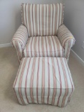 (MBR) RED AND WHITE UPHOLSTERED STRIPED ROCKING SWIVEL ARM CHAIR WITH OTTOMAN. MEASURES APPROX 34