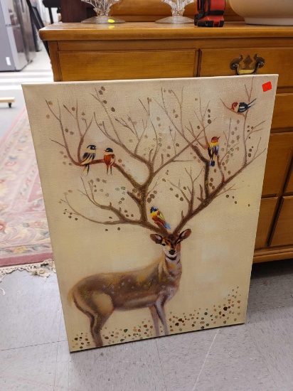 (R1) PRINT ON CANVAS OF A DEER POSING WITH BRANCH ANTLERS & MULTI COLORED BIRDS SITTING. IT MEASURES