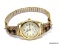 NADIA QUARTZ GOLD TONE WRIST WATCH WITH STERLING SILVER GOLD VERMEIL & BLACK ONYX WATCH ARMS WITH