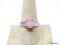 .925 STERLING SILVER RING WITH OVAL CUSHION CUT PRONG SET LAB CREATED PINK OPAL GEMSTONE. MARKED ON