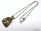 LIA SOPHIA BRONZE TONE GEMSTONE PENDANT WITH MATCHING CHAIN. THE CHAIN FEATURES A LOBSTER CLASP & A