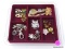 TRAY LOT OF MISC. COSTUME JEWELRY TO INCLUDE A SILVER TONE SNOWMAN BROOCH WITH EARRINGS, KEY CHAINS,