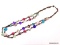 COLDWATER CREEK DOUBLE STRAND MULTI-COLORED SHELL NECKLACE WITH BRONZE TONED BEAD SPACERS. LOBSTER