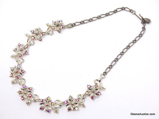 VINTAGE STAR GOLD/SILVER TONE FLORAL PINKISH ORANGE RHINESTONE NECKLACE. MARKED ON THE CLASP. IT