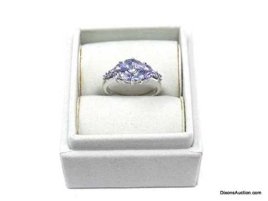 STAUER .925 STERLING SILVER & TANZANITE RING. FEATURES VARIOUS SIZED MARQUISE CUT TANZANITES IN A