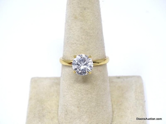 14KT H.G.E. YELLOW GOLD ENGAGEMENT RING WITH APPROX. 1 CT. PRONG SET CZ CENTER STONE. THE RING SIZE