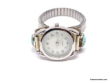 STAINLESS STEEL QUARTZ WRIST WATCH WITH STERLING SILVER & TURQUOISE ARMS, ALONG WITH A STAINLESS