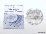 UNIQUE METAL GIFTWARE BY WENDELL AUGUST FORGE - ROUND SILVER TONED DISC ORNAMENT OF MABRY HILL BLUE
