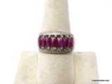 .925 STERLING SILVER RING WITH A ROW OF SIX MARQUISE CUT RUBY GEMSTONES & ETCHED DETAILING. MARKED