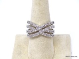 LIA SOPHIA SILVER TONE MULTI-ROW CROSS OVER CZ ACCENTED RING. MARKED ON THE INSIDE. THE RING SIZE IS