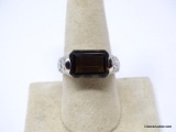 LIA SOPHIA SILVER TONE FILIGREE SMOKY QUARTZ GEMSTONE RING. MARKED ON THE INSIDE. THE RING SIZE IS