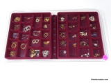 TRAY LOT FULL OF MISC. COSTUME JEWELRY CHARMS/EARRINGS. COMES IN HARD PLASTIC TRAY.