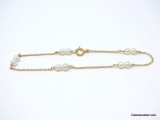 14K YELLOW GOLD & PEARL BRACELET. FIVE DOUBLE PEARL SECTIONS, ROPE STYLE CHAIN WITH A 