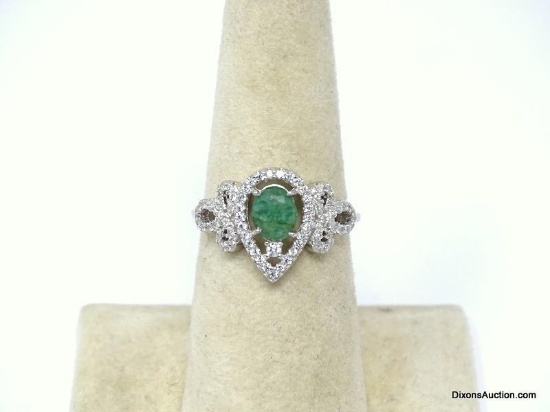 .925 AAA UNHEATED NATURAL AFRICAN OVAL FACETED CENTER EMERALD RING WITH CZ ACCENTS. 14KT WHITE GOLD