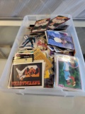 SMALL PLASTIC STORAGE BIN OF ASSORTED SPORTS CARDS. INCLUDES PLAYERS SUCH AS: GREGG JEFFERIES, WADE