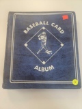BLUE BASEBALL CARD ALBUM FILLED WITH OVER 30 SHEETS OF ASSORTED BASEBALL CARDS. INCLUDES PLAYERS