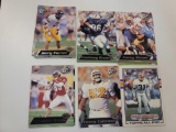 ROW LOT OF ASSORTED FOOTBALL CARDS. MOST ARE YEARS 2000-2001. INCLUDES PLAYERS SUCH AS: TRAVIS