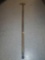 BRASS WALKING CANE, PUTTER STYLE HANDLE. SHINY HANDLE, POLE HAS A DARK PATINA, 36 1/2