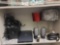 SHELF LOT OF ASSORTED ITEMS. INCLUDES: 2 SMALL TABLE LAMPS, 2 DELL COMPUTER SPEAKERS, 3 LAPTOP