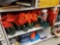 SHELF LOT TO INCLUDE 6 FAUX. POINSETTIA PLANTS, A PACK OF 9 FT. 50 LIGHT PRE-LIT GARLAND, CHRISTMAS