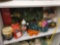SHELF LOT TO INCLUDE BRAND NEW 9 FT. GOLD TRIM GARLAND, ORANGE EXTENSION CORD, CHRISTMAS STRING