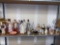 SHELF LOT OF ASSORTED ITEMS TO INCLUDE, 8 ORIENTAL DOLLS ALL STANDING, A AFRICAN STYLE COFFEE CUP,