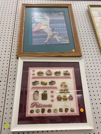 LOT OF TWO FRAMED PRINTS TO INCLUDE A WHITE FRAMED CROSS STITCHED PIECE OF BAKERY ITEMS AND WITH THE