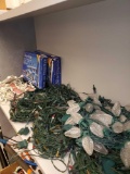 SHELF LOT OF CHRISTMAS LIGHTS, VARIOUS TYPES, MULTI COLOR AND CLEAR.